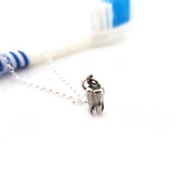 tiny tooth sterling silver necklace